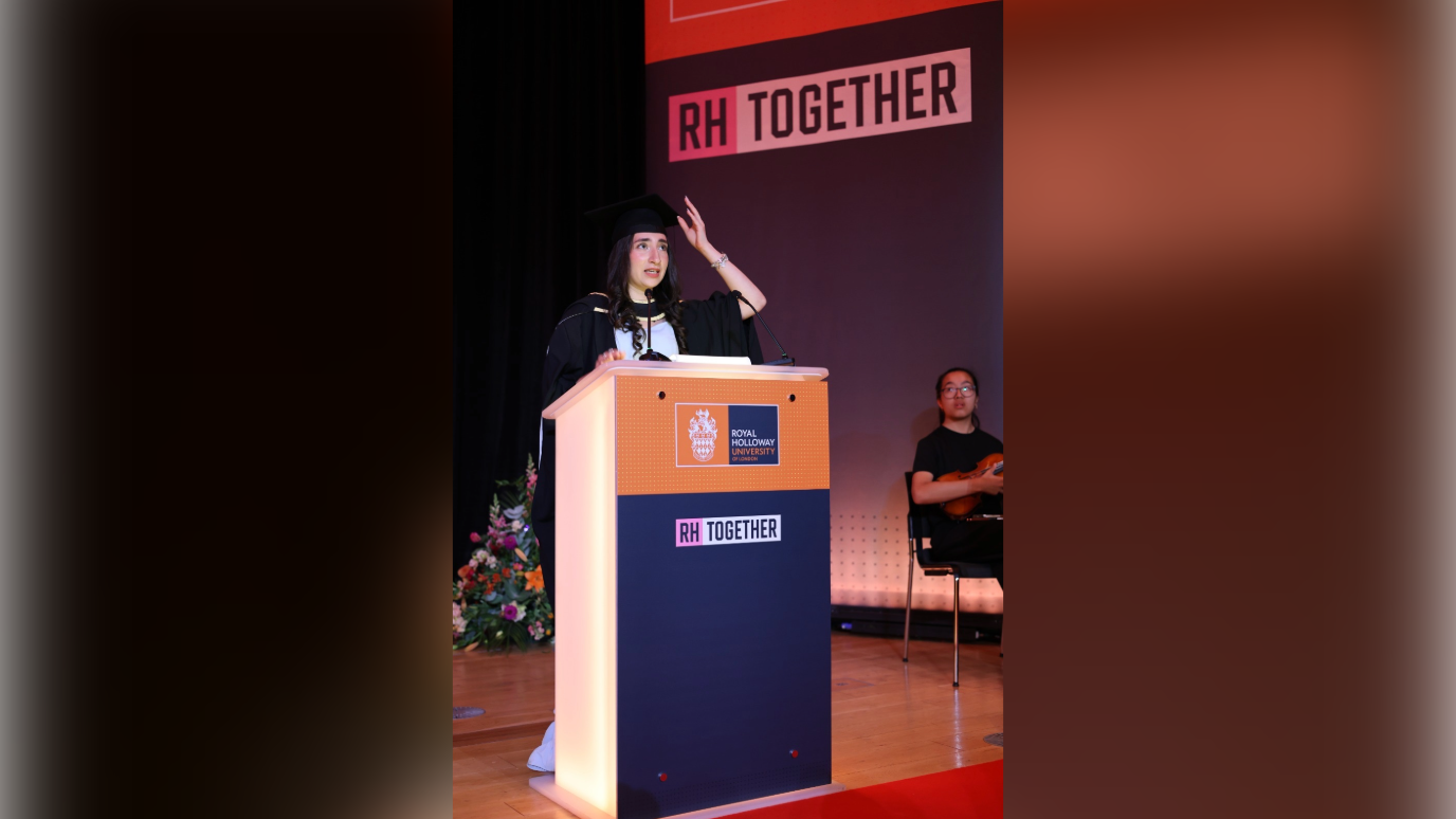 Sarah giving speech as Student Orator during graduation ceremony 